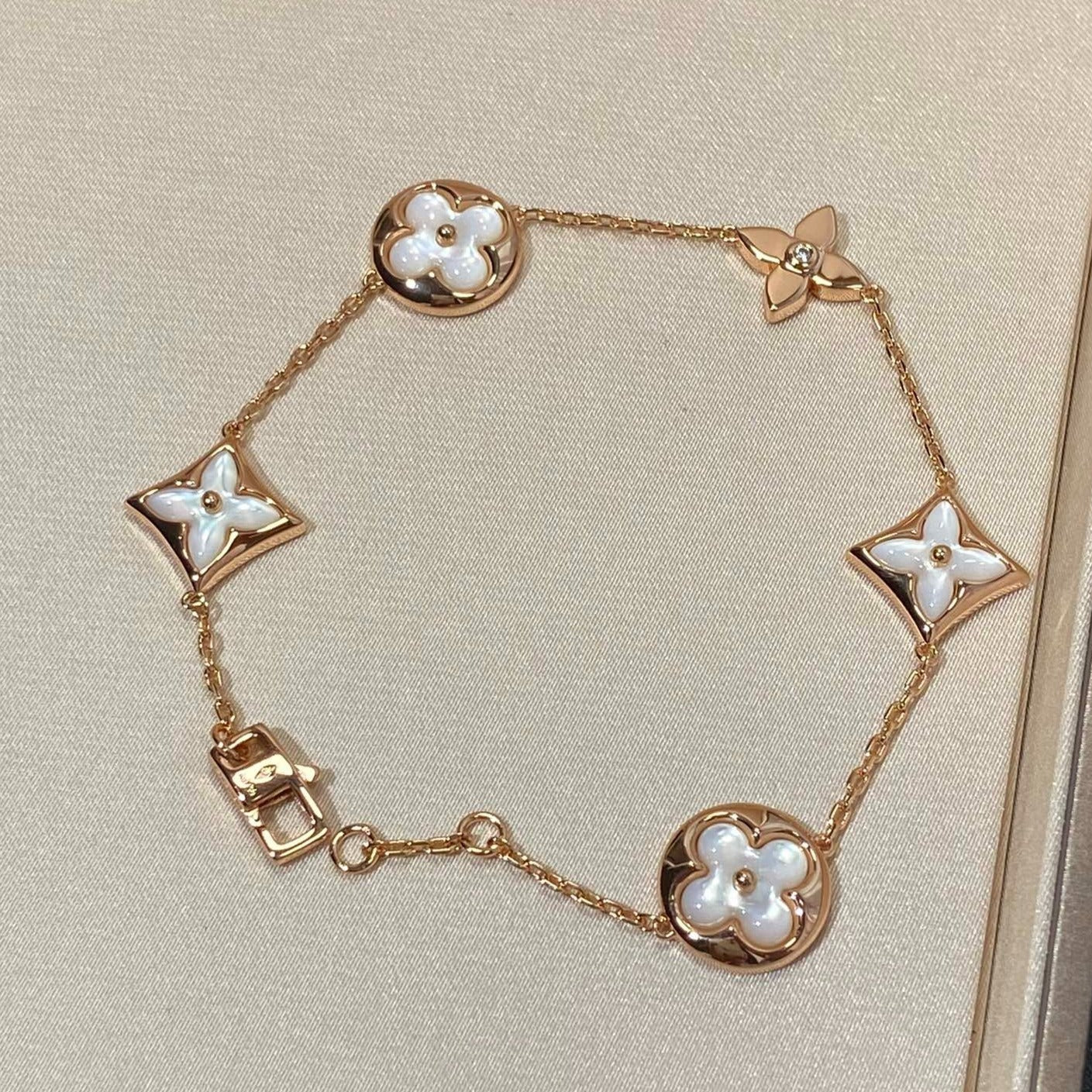 [Olivia Jewelry]STAR AND SUN 5 MOTIF MOP PINK GOLD BRACELET