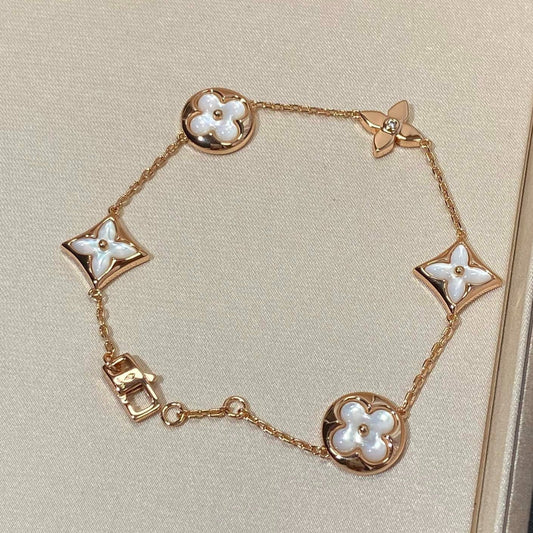 [Olivia Jewelry]STAR AND SUN 5 MOTIF MOP PINK GOLD BRACELET