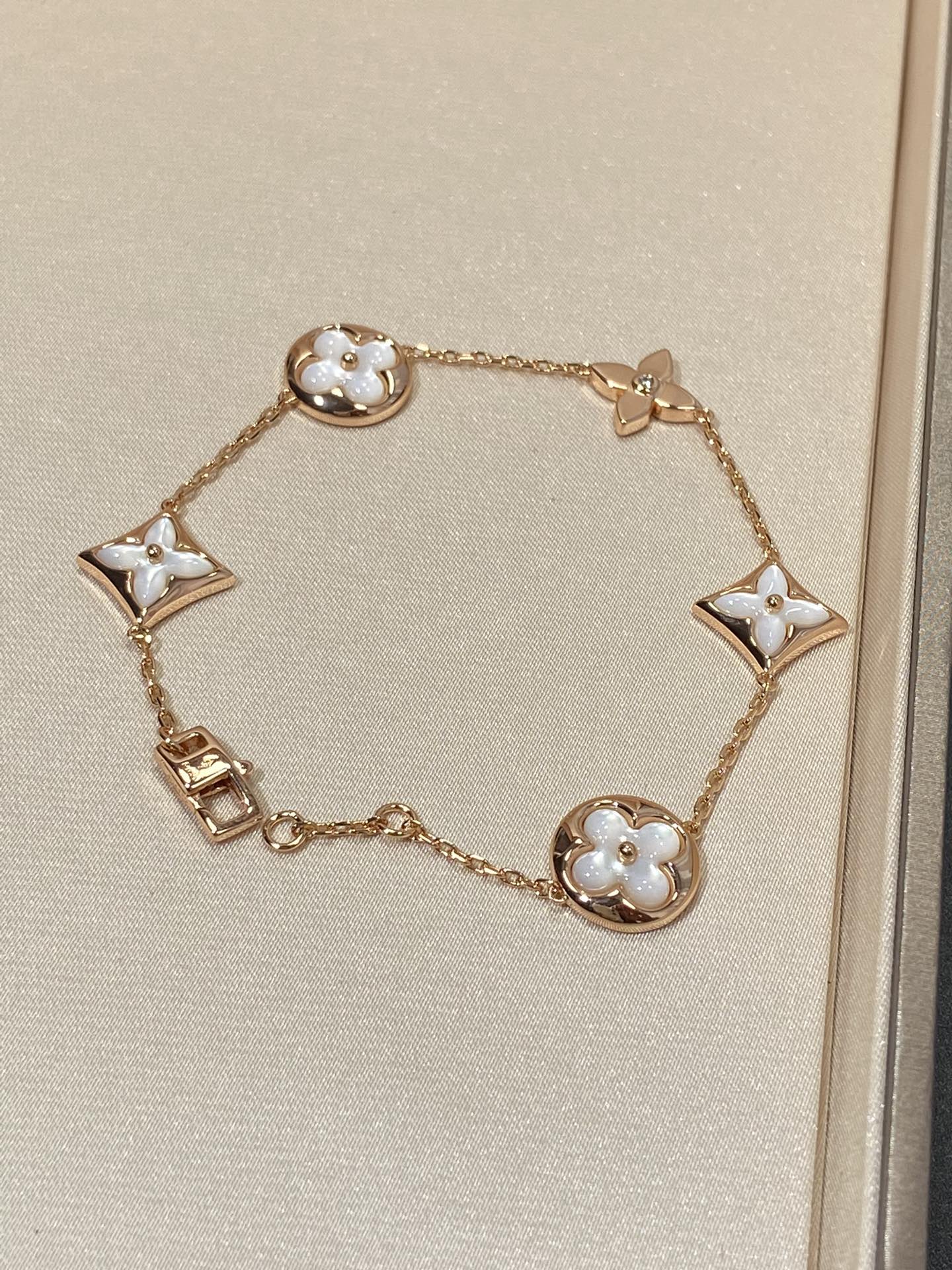 [Olivia Jewelry]STAR AND SUN 5 MOTIF MOP PINK GOLD BRACELET