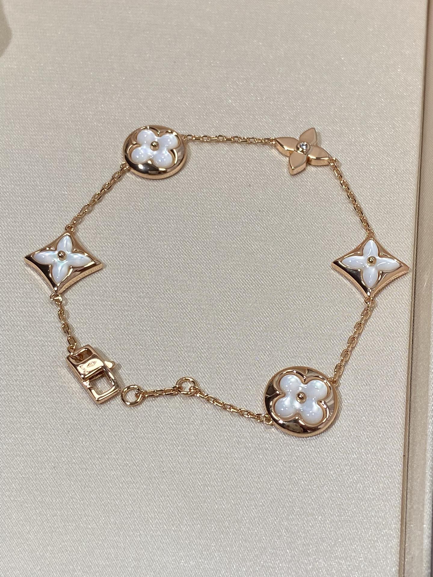 [Olivia Jewelry]STAR AND SUN 5 MOTIF MOP PINK GOLD BRACELET