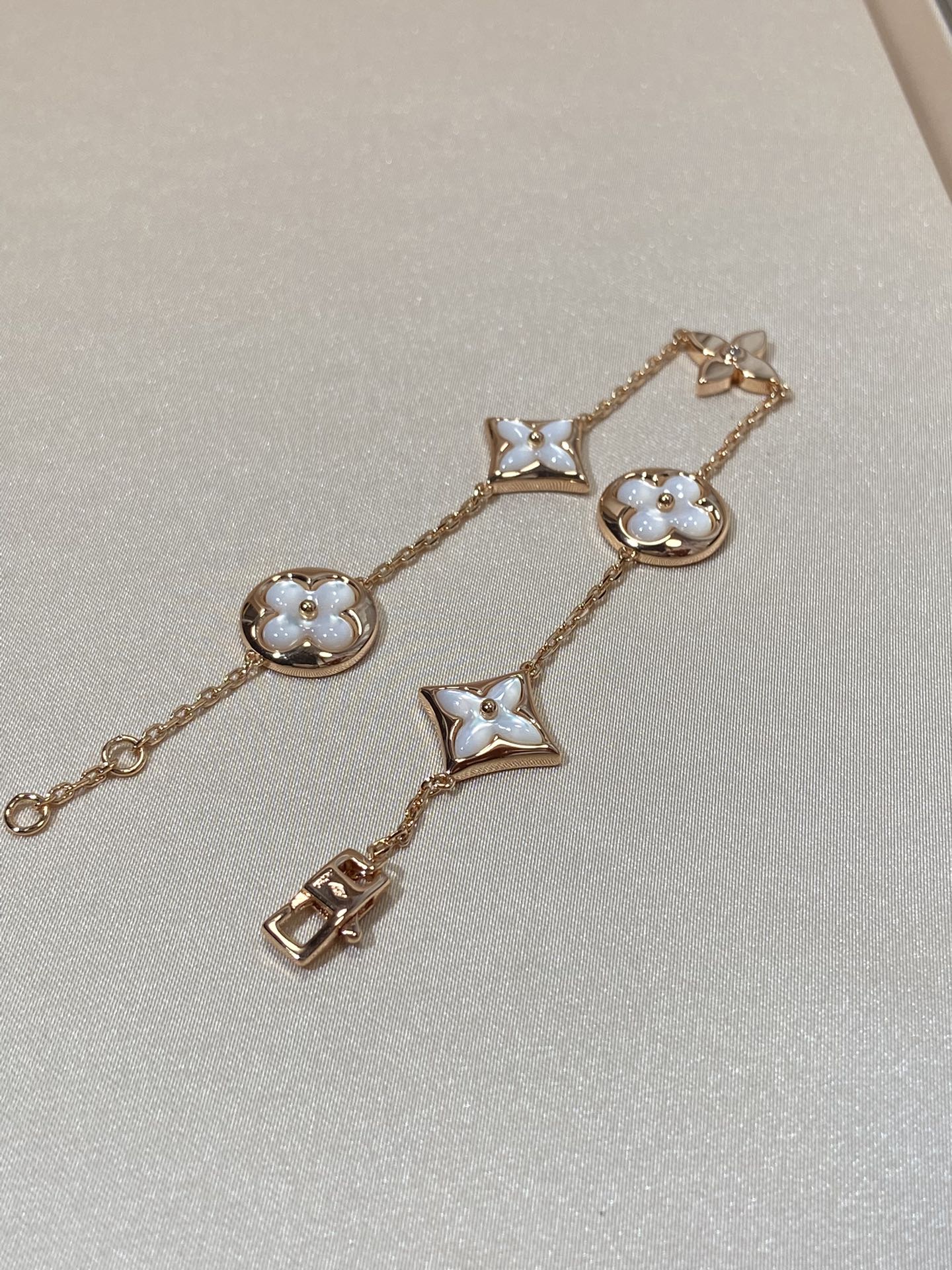 [Olivia Jewelry]STAR AND SUN 5 MOTIF MOP PINK GOLD BRACELET
