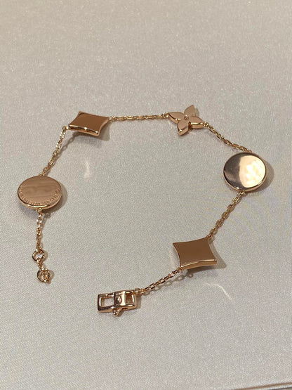 [Olivia Jewelry]STAR AND SUN 5 MOTIF MOP PINK GOLD BRACELET