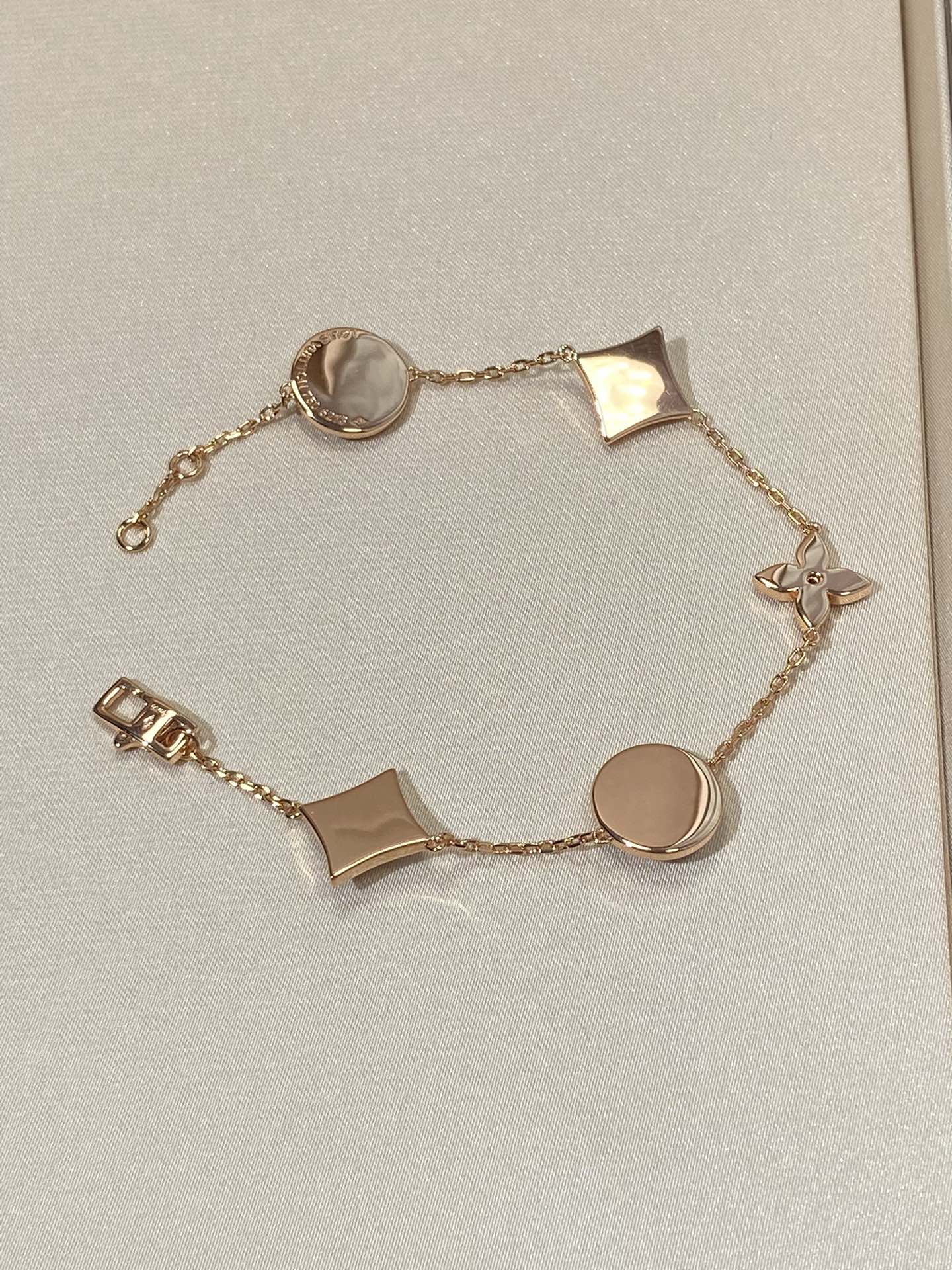 [Olivia Jewelry]STAR AND SUN 5 MOTIF MOP PINK GOLD BRACELET
