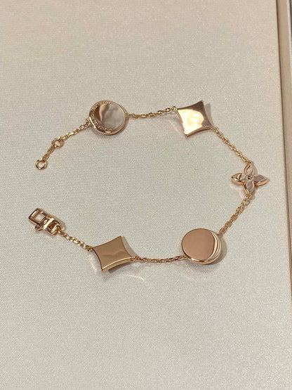 [Olivia Jewelry]STAR AND SUN 5 MOTIF MOP PINK GOLD BRACELET